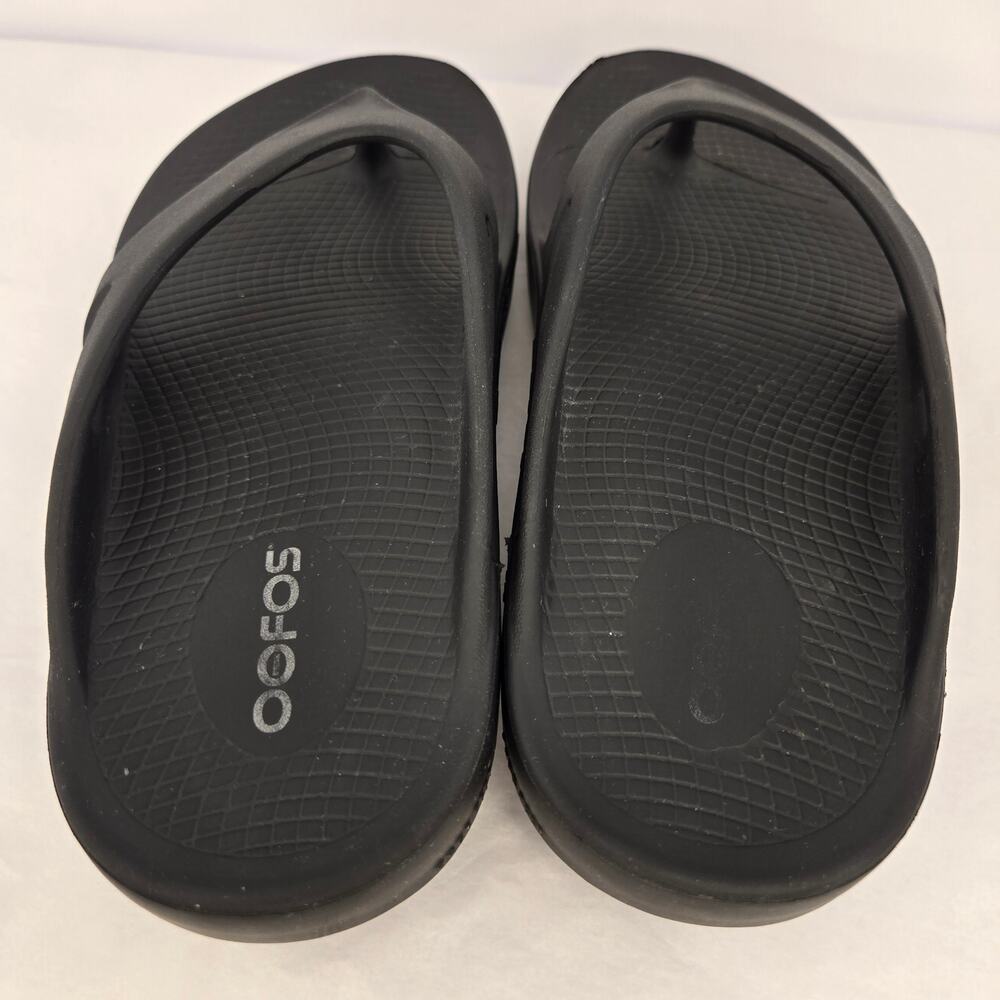 OOFOS Ooriginal thong flip-flops in classic black.